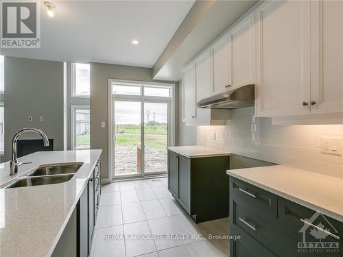 4952 Abbott Street E, Ottawa, ON - Indoor Photo Showing Kitchen With Double Sink