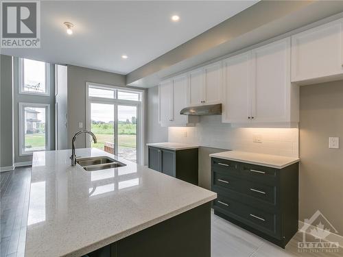 4952 Abbott Street E, Ottawa, ON - Indoor Photo Showing Kitchen With Double Sink