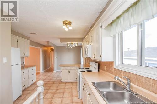 3893 Des Fondateurs Boulevard, Saint-Isidore, NB - Indoor Photo Showing Kitchen With Double Sink