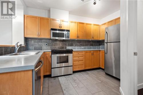 309 2263 Redbud Lane, Vancouver, BC - Indoor Photo Showing Kitchen With Stainless Steel Kitchen With Double Sink