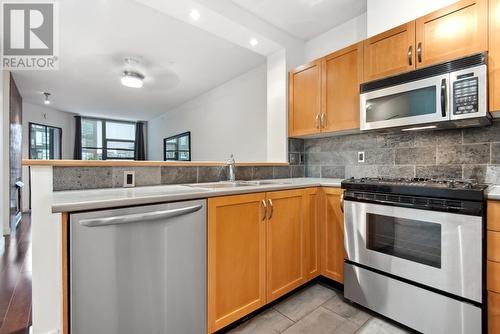 309 2263 Redbud Lane, Vancouver, BC - Indoor Photo Showing Kitchen With Stainless Steel Kitchen With Double Sink