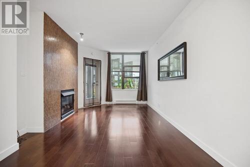 309 2263 Redbud Lane, Vancouver, BC - Indoor Photo Showing Other Room With Fireplace