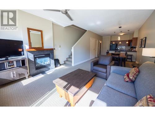 2049 Summit Drive Unit# 313A, Panorama, BC - Indoor Photo Showing Living Room With Fireplace