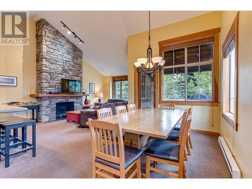 47 Rivermount Place Unit# 101A, Fernie, BC - Indoor Photo Showing Dining Room With Fireplace