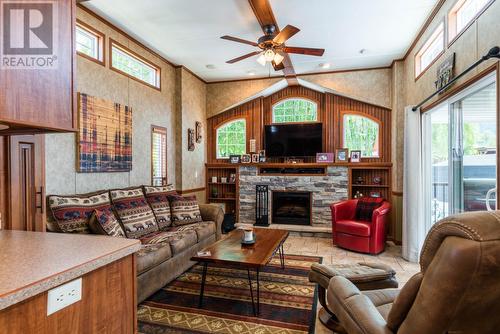 1835 Bakery Frontage Road Unit# 108, Christina Lake, BC - Indoor Photo Showing Living Room With Fireplace