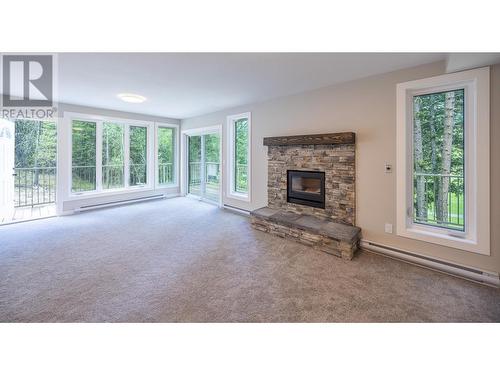 7977 Radium Golf Course Road Unit# 1, Radium Hot Springs, BC - Indoor Photo Showing Living Room With Fireplace