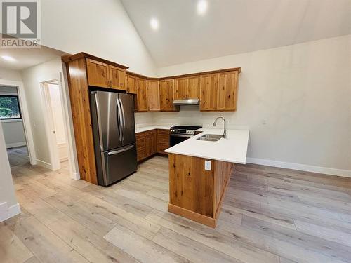 1938 Foxwood  Trail Unit# 4, Windermere, BC - Indoor Photo Showing Kitchen With Double Sink