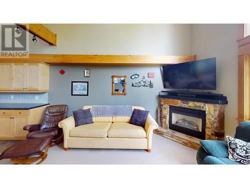 1005 Mountain View Road Unit# 4D, Rossland, BC - Indoor Photo Showing Living Room With Fireplace