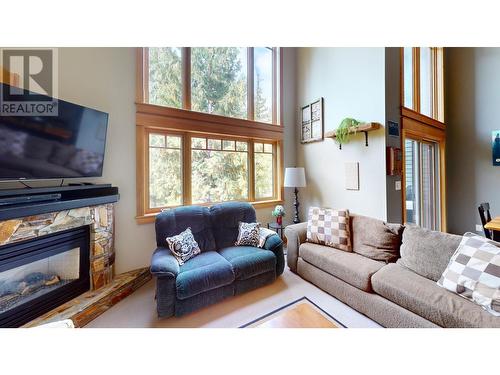 1005 Mountain View Road Unit# 4D, Rossland, BC - Indoor Photo Showing Living Room With Fireplace