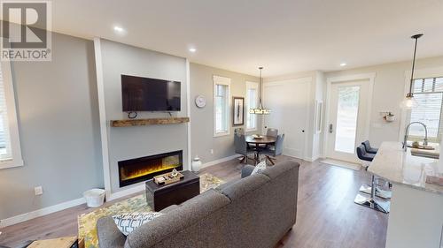 900 Bighorn Boulevard Unit# 920, Radium Hot Springs, BC - Indoor Photo Showing Living Room With Fireplace