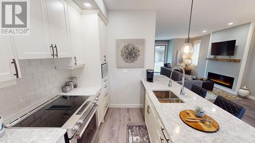 900 Bighorn Boulevard Unit# 920, Radium Hot Springs, BC - Indoor Photo Showing Kitchen With Double Sink With Upgraded Kitchen