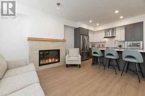 703 15A  Crescent Unit# 15, Invermere, BC - Indoor With Fireplace