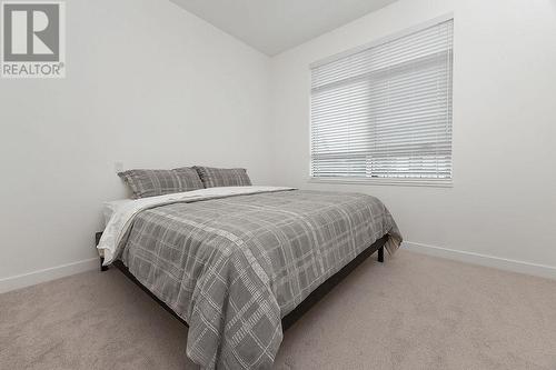 703 15A  Crescent Unit# 15, Invermere, BC - Indoor Photo Showing Bedroom