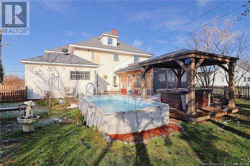 209 Main Street, Chipman, NB - Outdoor With Above Ground Pool With Deck Patio Veranda