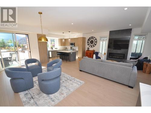 910 Lakeside Drive Unit# 104, Nelson, BC - Indoor Photo Showing Living Room With Fireplace