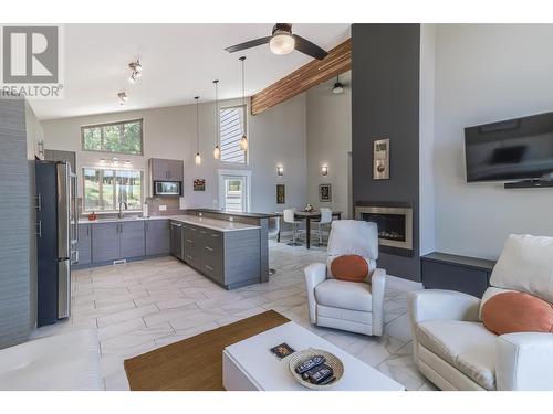 147 The Whins, Cranbrook, BC - Indoor Photo Showing Living Room With Fireplace