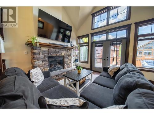 437 Canyon  Trail Unit# A, Fernie, BC - Indoor Photo Showing Living Room With Fireplace