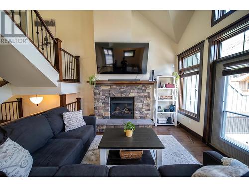 437 Canyon  Trail Unit# A, Fernie, BC - Indoor Photo Showing Living Room With Fireplace