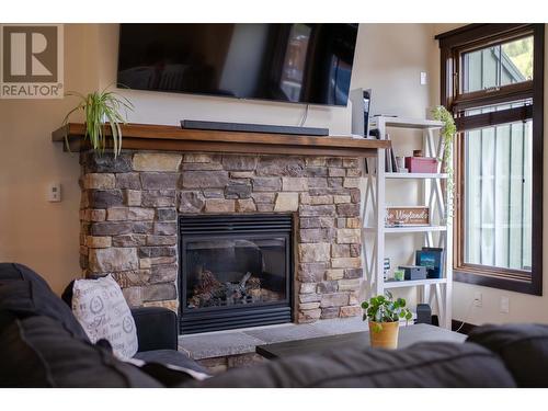 437 Canyon  Trail Unit# A, Fernie, BC - Indoor Photo Showing Living Room With Fireplace