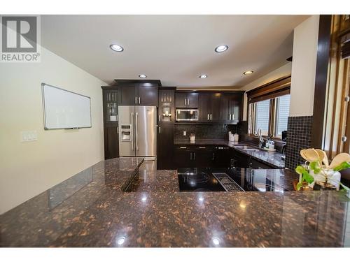 437 Canyon  Trail Unit# A, Fernie, BC - Indoor Photo Showing Kitchen With Upgraded Kitchen