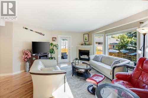 422 Beasley  W Crescent, Nelson, BC - Indoor Photo Showing Living Room With Fireplace