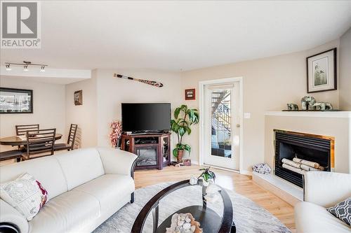 422 Beasley  W Crescent, Nelson, BC - Indoor Photo Showing Living Room With Fireplace