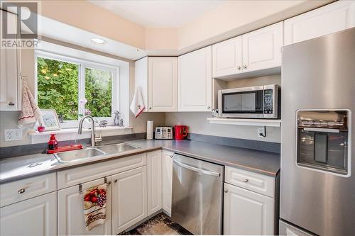 422 Beasley  W Crescent, Nelson, BC - Indoor Photo Showing Kitchen With Double Sink