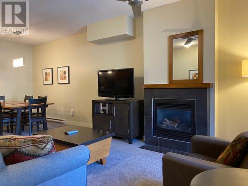 2049 Summit  Drive Unit# 214D, Panorama, BC - Indoor Photo Showing Living Room With Fireplace