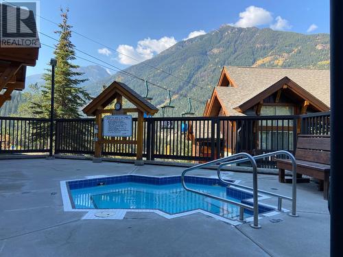 2049 Summit  Drive Unit# 214D, Panorama, BC - Outdoor With In Ground Pool