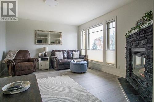 4878 Ridge Road Unit# 6, Radium Hot Springs, BC - Indoor Photo Showing Living Room With Fireplace