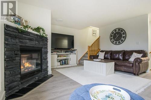 4878 Ridge Road Unit# 6, Radium Hot Springs, BC - Indoor Photo Showing Living Room With Fireplace