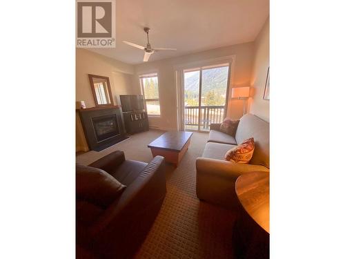 2049 Summit  Drive Unit# 312A, Panorama, BC - Indoor Photo Showing Living Room With Fireplace