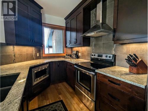 5150 Fairway  Drive Unit# 29-A3, Fairmont Hot Springs, BC - Indoor Photo Showing Kitchen With Stainless Steel Kitchen