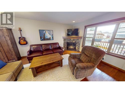 1000 9Th  Street Unit# 23, Invermere, BC - Indoor Photo Showing Living Room With Fireplace