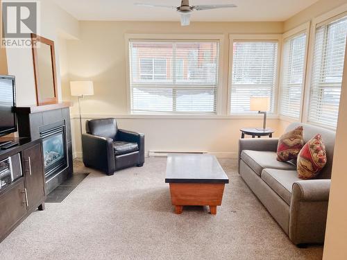 2049 Summit Drive Unit# 115D, Panorama, BC - Indoor Photo Showing Living Room With Fireplace