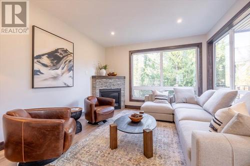 4576 Timberline Crescent Unit# 40, Fernie, BC - Indoor Photo Showing Living Room With Fireplace