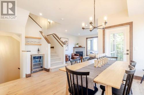 4576 Timberline Crescent Unit# 40, Fernie, BC - Indoor Photo Showing Dining Room With Fireplace