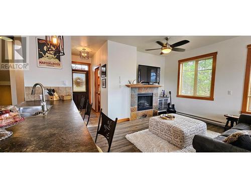 906 6Th  Avenue Unit# 1, Invermere, BC - Indoor Photo Showing Living Room With Fireplace