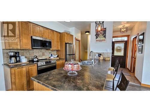 906 6Th  Avenue Unit# 1, Invermere, BC - Indoor Photo Showing Kitchen With Double Sink