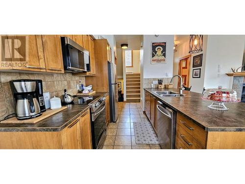 906 6Th  Avenue Unit# 1, Invermere, BC - Indoor Photo Showing Kitchen With Double Sink