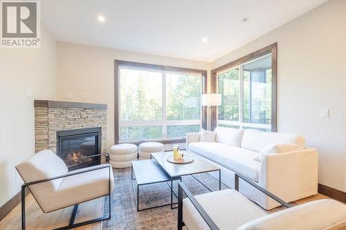 4576 Timberline Crescent Unit# 39, Fernie, BC - Indoor Photo Showing Living Room With Fireplace