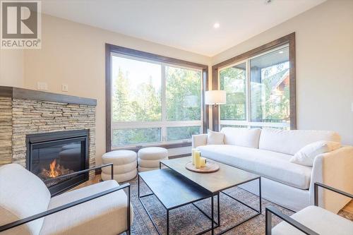 4576 Timberline Crescent Unit# 39, Fernie, BC - Indoor Photo Showing Living Room With Fireplace