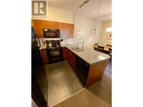 2049 Summit Drive Unit# 214C, Panorama, BC - Indoor Photo Showing Kitchen With Double Sink