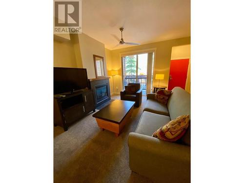 2049 Summit Drive Unit# 214C, Panorama, BC - Indoor Photo Showing Living Room With Fireplace