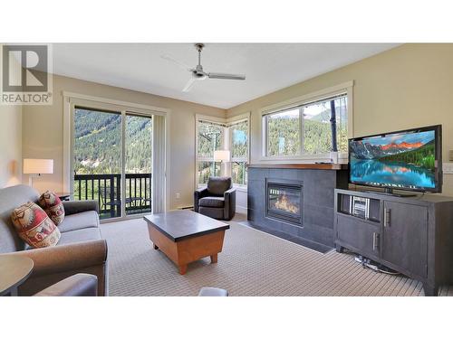 2049 Summit Drive Unit# 314A, Panorama, BC - Indoor Photo Showing Living Room With Fireplace