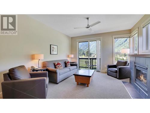 2049 Summit Drive Unit# 314A, Panorama, BC - Indoor Photo Showing Living Room With Fireplace