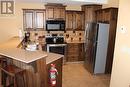 1351 Gerry Sorensen Way Unit# E2-D, Kimberley, BC  - Indoor Photo Showing Kitchen With Double Sink 