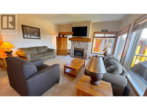 1351 Gerry Sorensen Way Unit# C4-C, Kimberley, BC - Indoor Photo Showing Living Room With Fireplace