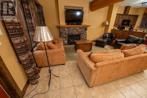 1351 Gerry Sorensen Way Unit# M2-A, Kimberley, BC - Indoor Photo Showing Living Room With Fireplace