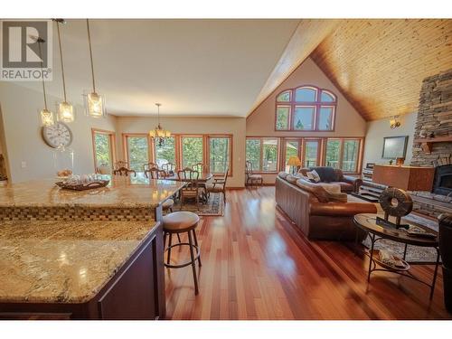 9865 Osprey Landing Drive, Wardner, BC - Indoor Photo Showing Living Room With Fireplace